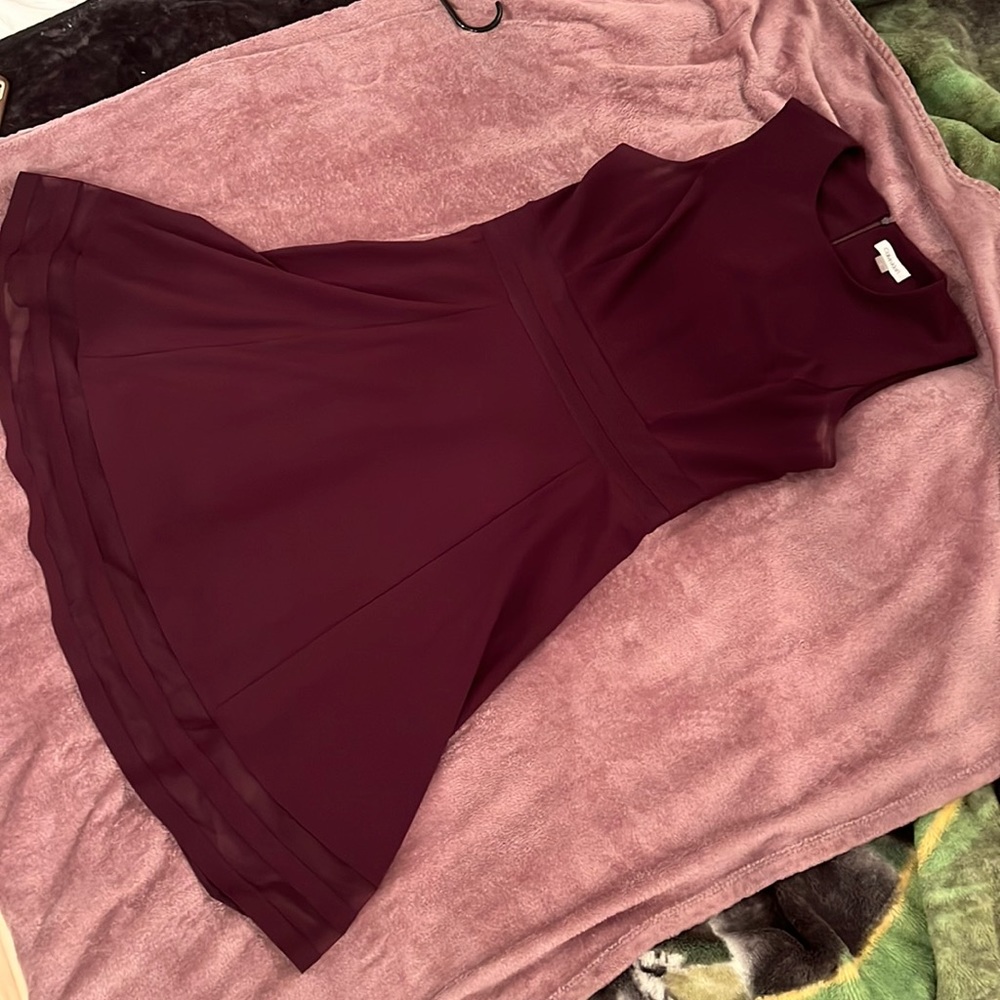 Brand: Calvin Klein. Color: Maroon. Woman’s size 12.